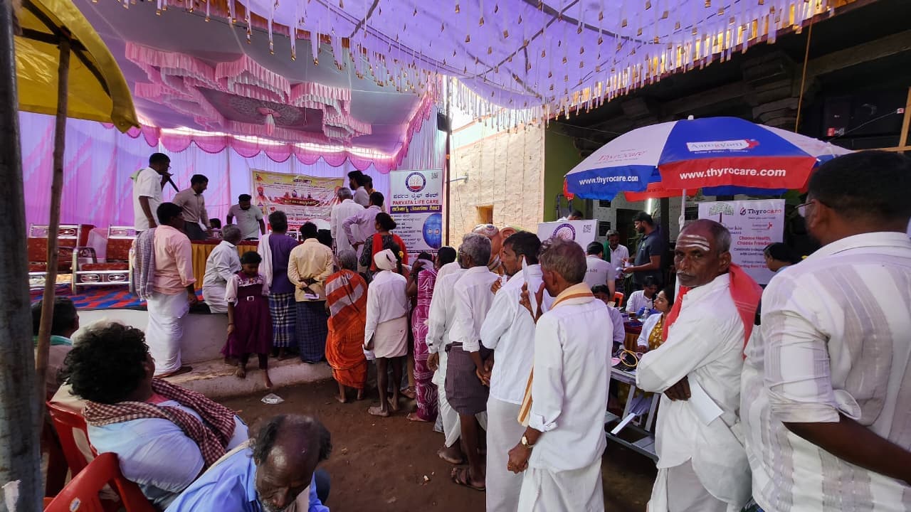 Village community health camp under pandal with Parvata Life Care and Thyrocare diagnostics
